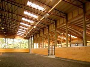 The ceiling of an arena built by Spane Building in Redmond Washington complete with horse barn