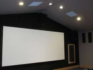 Theater screen in the Wulff garage on Orcas Island WA by Spane Buildings