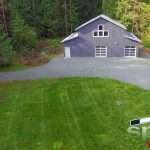 Spane post frame motorcycle garage built on Whidbey Island WA corner